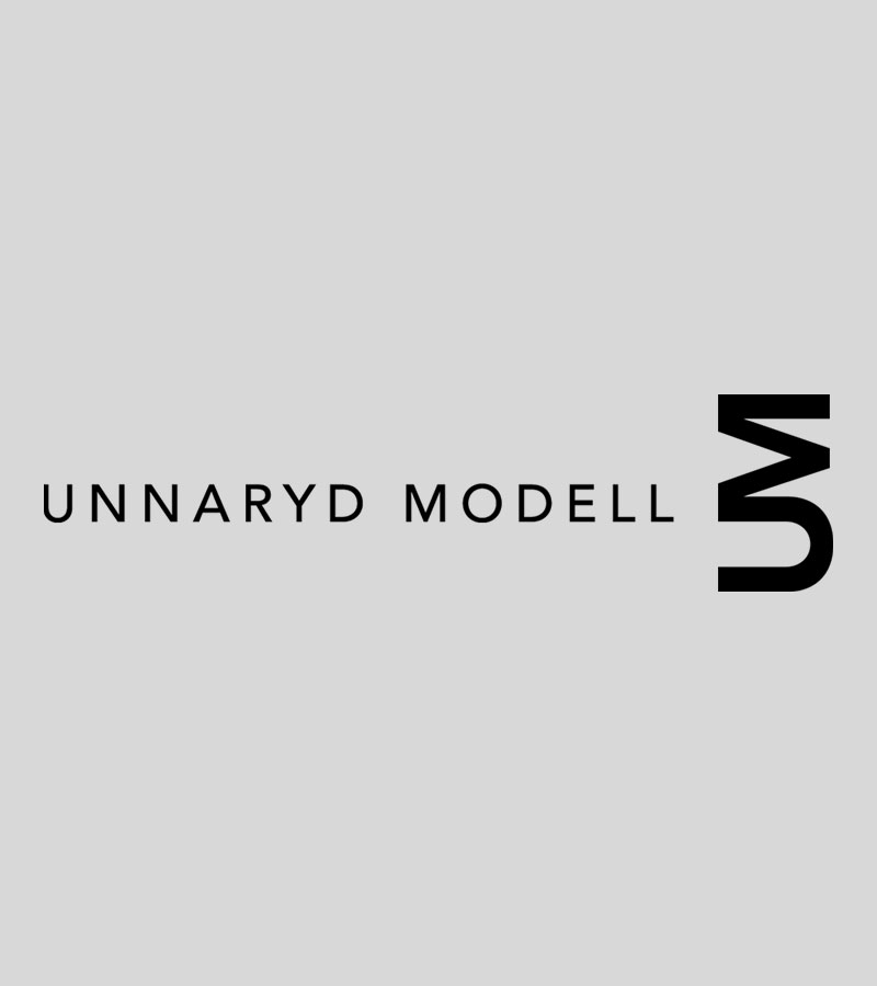 Logo Unnaryd Modell Unnaryd Modells logotyp på grå bakgrund